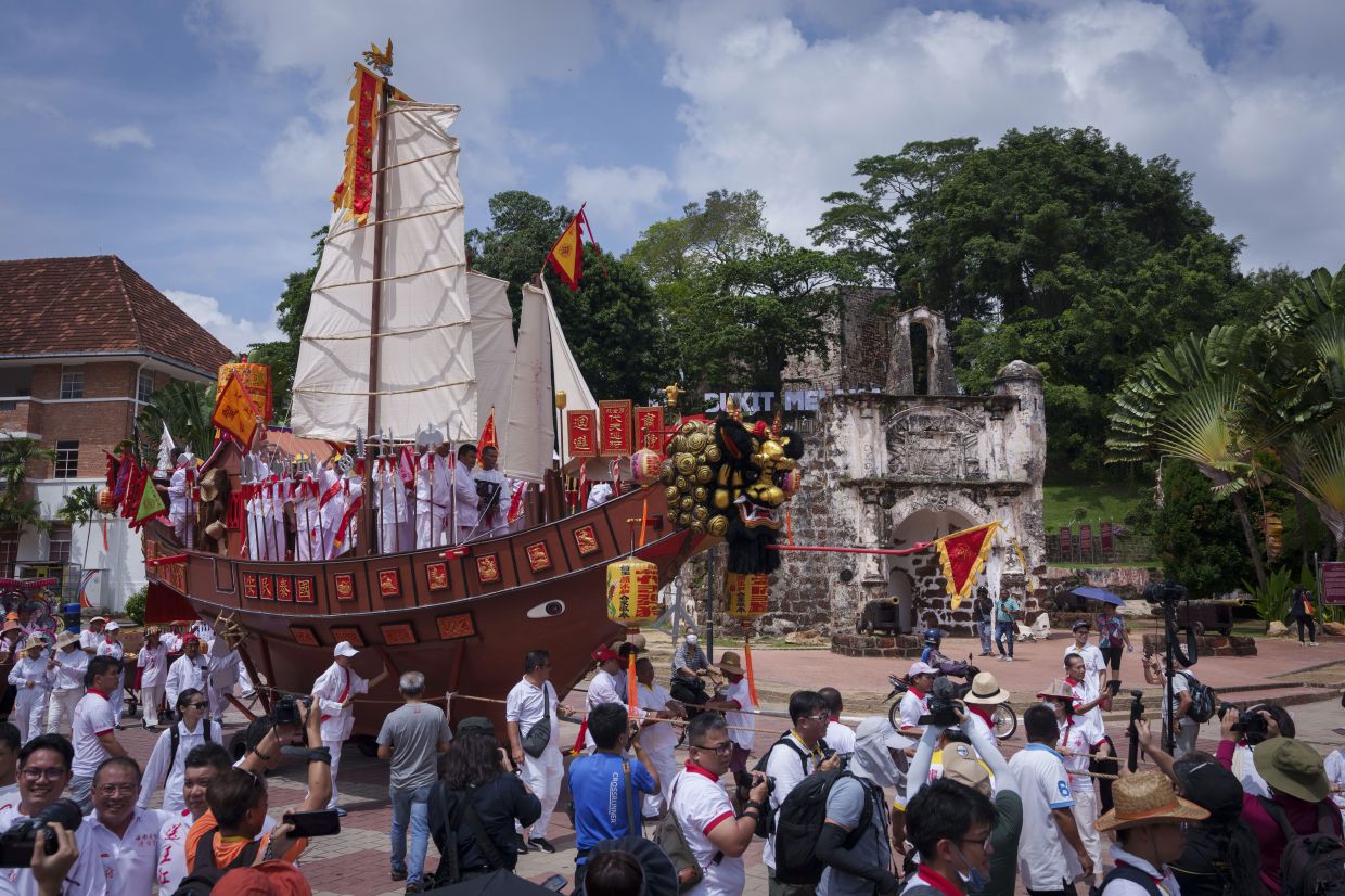 ‘Sailing’ through the streets of Melaka, cleansing the historic city